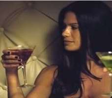 Rhona Mitra consuming alcohol